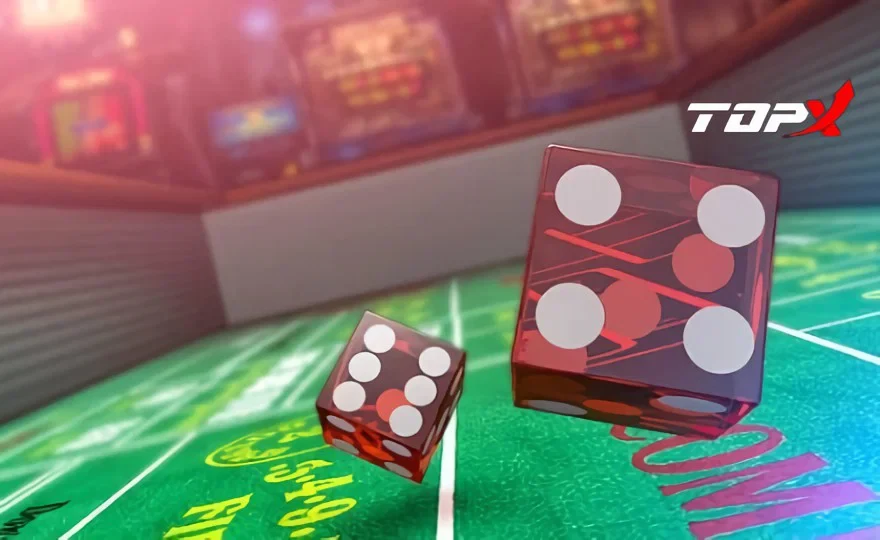Dados vermelhos sobre uma mesa de jogo verde com o logotipo da TopX